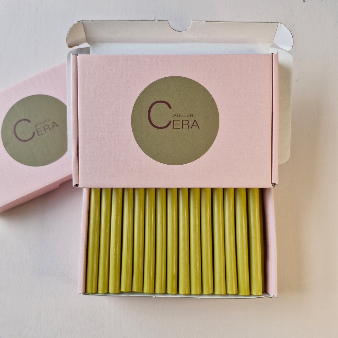 Open pink box showcasing 30 lagoon-colored 11mm x 100mm sealing wax sticks, perfect for seals and handmade projects.