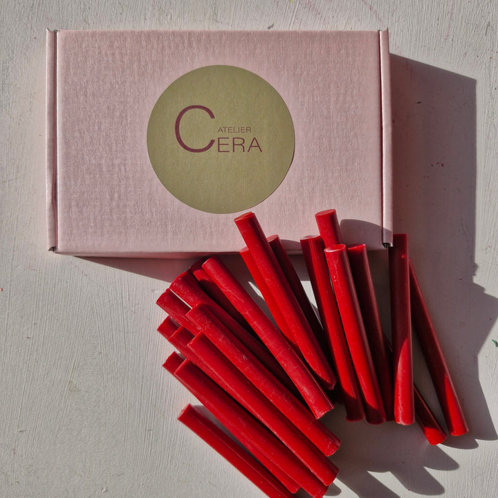 Box of 250 classic red 11mm sealing wax sticks with several sticks displayed outside the box. Ideal for office supplies and crafting.