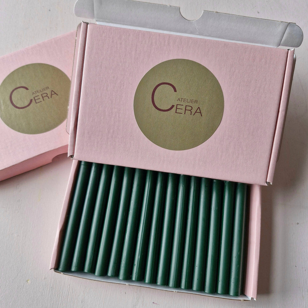 Open pink box displaying 30 British Racing Green 11mm sealing wax sticks, perfect for DIY and crafting purposes.