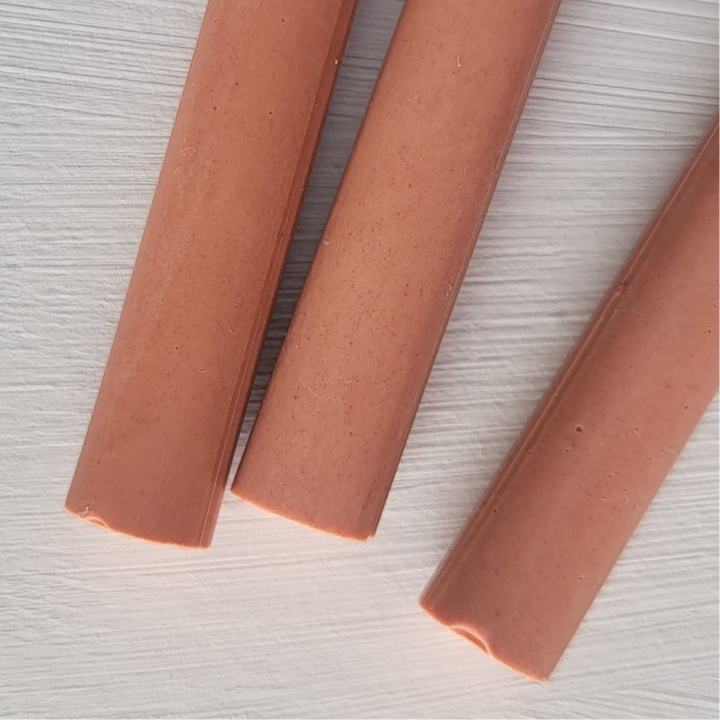 Close-up of terracotta-colored 11mm sealing wax sticks from a 10-pack, ideal for office and crafting use.