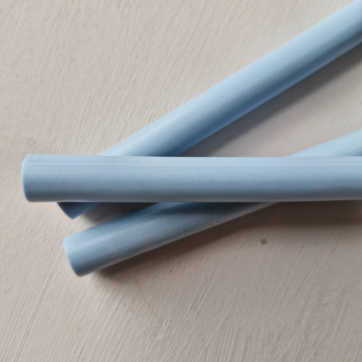 Close-up of French Blue 11mm sealing wax sticks from a 10-pack, perfect for crafts, invitations, and handmade projects.