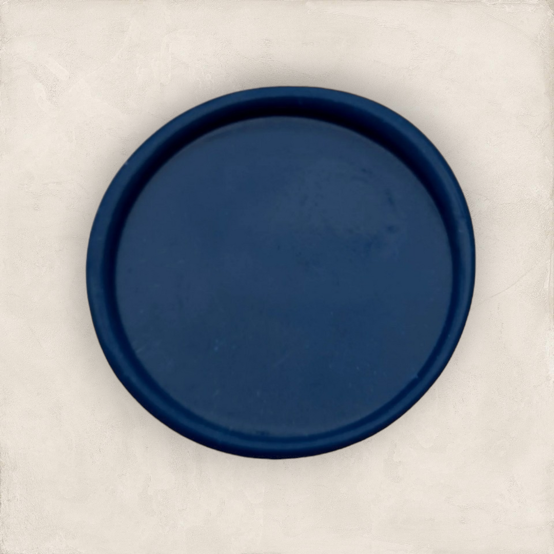 Close-up of navy blue sealing wax with a smooth finish, perfect for high-quality crafting and sealing applications.