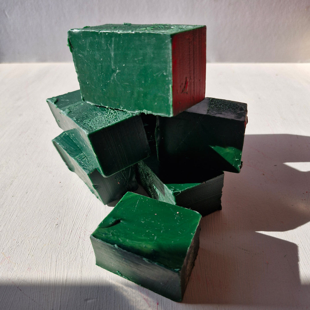 Stack of British Racing Green bottle sealing wax blocks with a smooth finish, ideal for crafting and sealing projects.