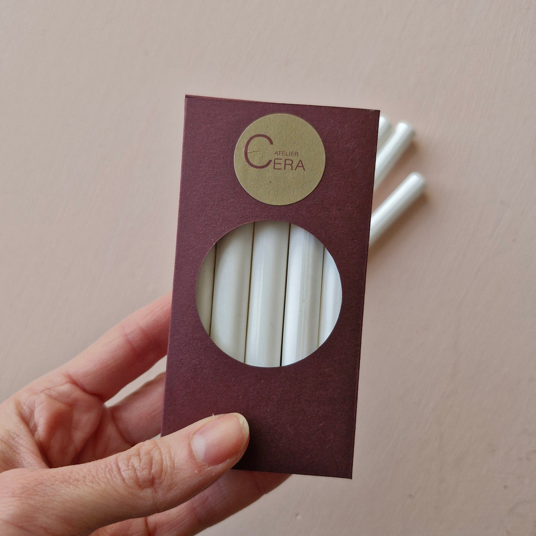 10 pack of Chelsea white sealing wax sticks, 11mm size, in a burgundy box with a circular window, ideal for glue gun use.