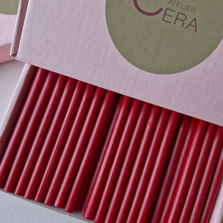 Box of 60 classic red 7mm sealing wax sticks neatly arranged, ideal for glue gun use and professional sealing projects.