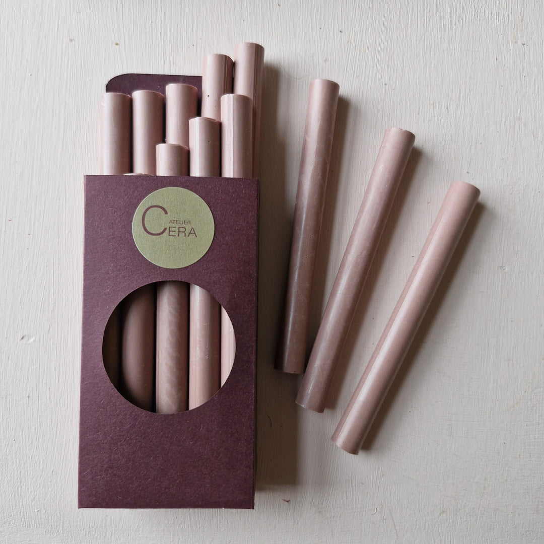 Pack of 10 sealing wax sticks in dusty rose, 11mm size. Handmade and ideal for use with a glue gun for wedding invitations and crafts.