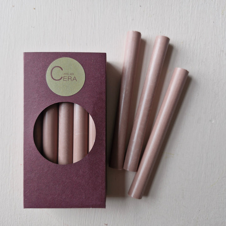 Pack of 10 sealing wax sticks in dusty rose, 11mm size. Handmade and ideal for use with a glue gun for wedding invitations and crafts.