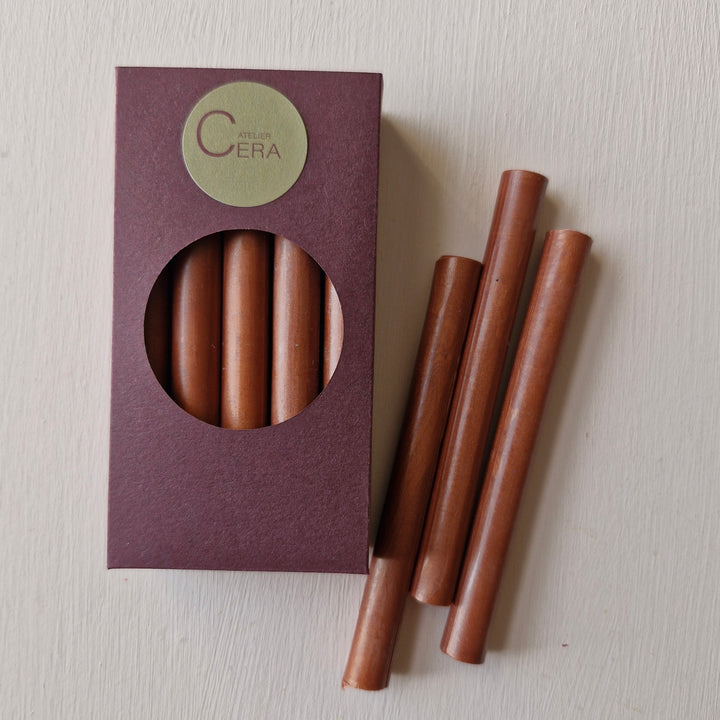 10 pack of copper sealing wax sticks in elegant packaging, ideal for creating decorative seals for invitations or branding.