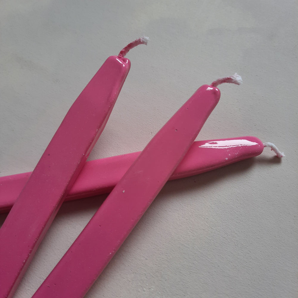 Close-up of vibrant Notting Hill Pink sealing wax sticks with wicks, hand-mixed for creating unique seals. Easy to melt and apply.